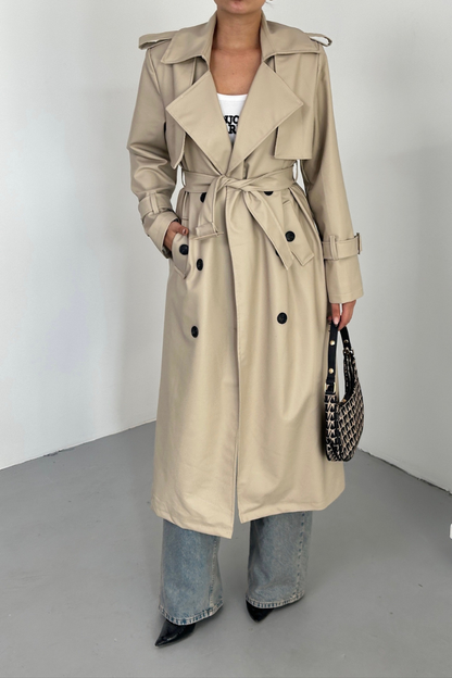 Kadın Trençkot Uzun Suni Deri Kemerli Düğmeli Cepli Yırtmaçlı Kruvaze Yaka Trençkot