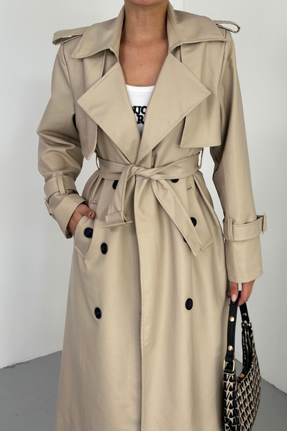 Kadın Trençkot Uzun Suni Deri Kemerli Düğmeli Cepli Yırtmaçlı Kruvaze Yaka Trençkot